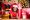 African American girl surrounded with Christmas presents.
