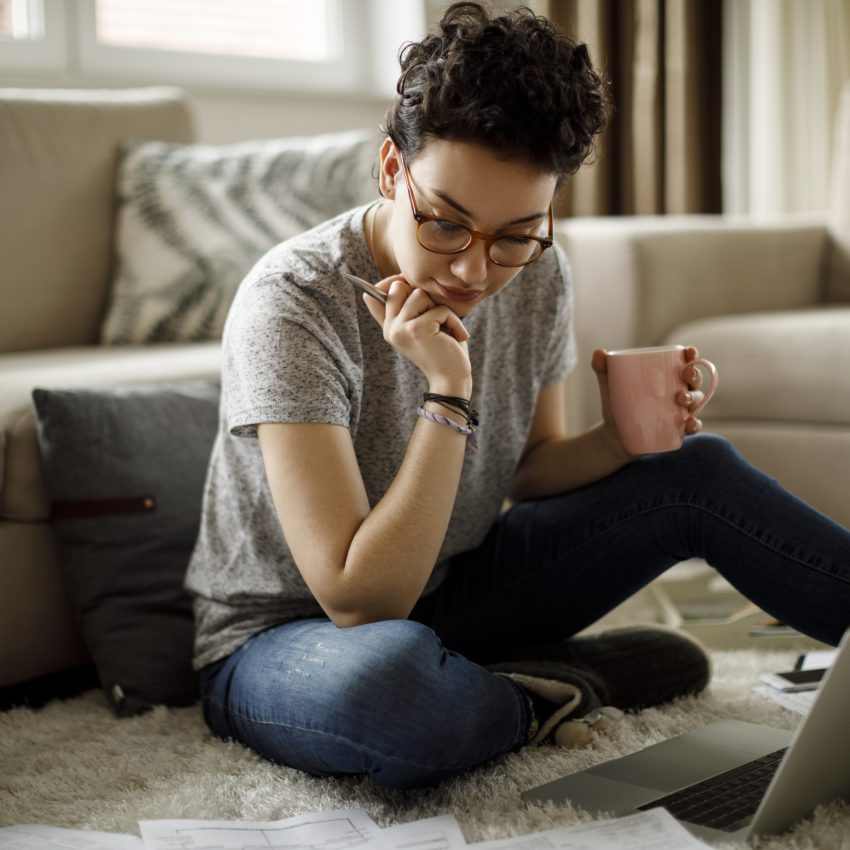 Young woman working at home