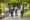 Group of happy students walking at the campus Four UAB college students walking across campus in between classes.